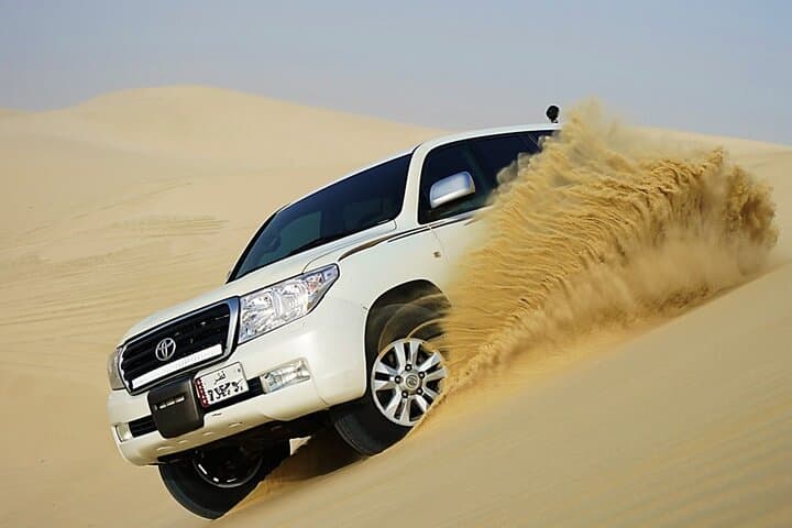 Private Half-Day Desert Safari from Doha — Dune Bashing, Camels & Inland Sea