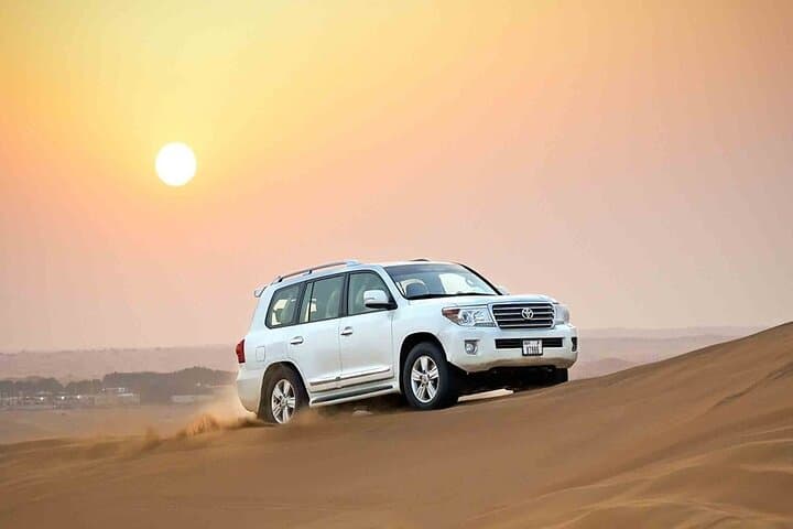 Dubai Red Dune Desert Safari: Evening Dune Bashing, Camel Rides & BBQ Experience photo 2