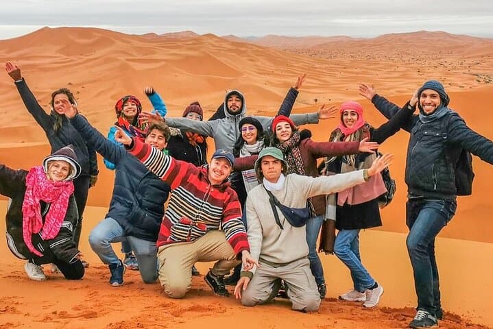 Dubai Desert Sunset Safari: Camel Ride, Sandboarding & BBQ Bedouin Camp