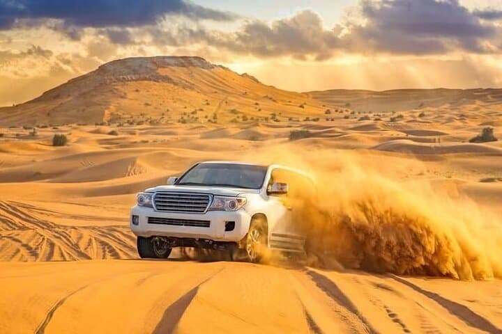 Dubai Red Dunes Safari: ATV, Camel Ride & 5-Star Desert BBQ Experience photo 2