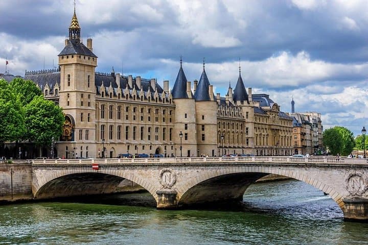3-in-1 Paris: Eiffel Tower History, Seine Boat Cruise & Notre-Dame Walking Tour photo 1