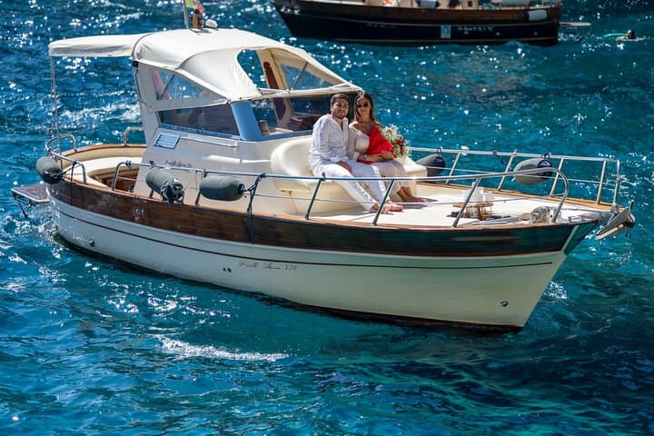 Capri Luxury Gozzo: 3-Hour Private Cruise to Blue Grotto, Faraglioni & Swim Stops