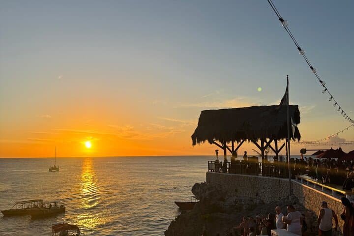 Discover Jamaica's Iconic Seven Miles Beach and Rick’s Café Adventure