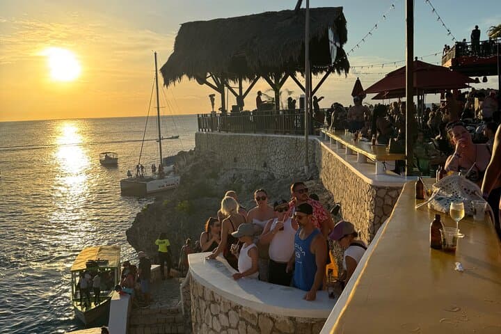 Discover Jamaica's Iconic Seven Miles Beach and Rick’s Café Adventure photo 2