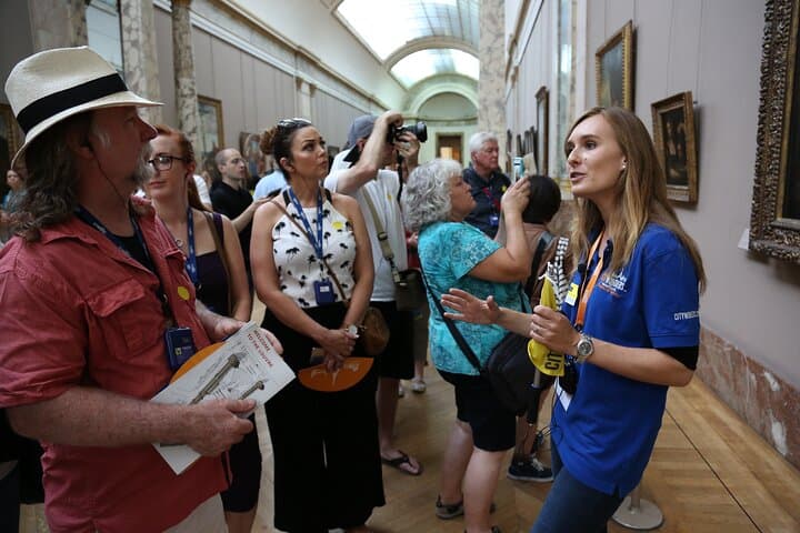 Evening Louvre Masterpieces Tour with Curated French Wine Tasting photo 3