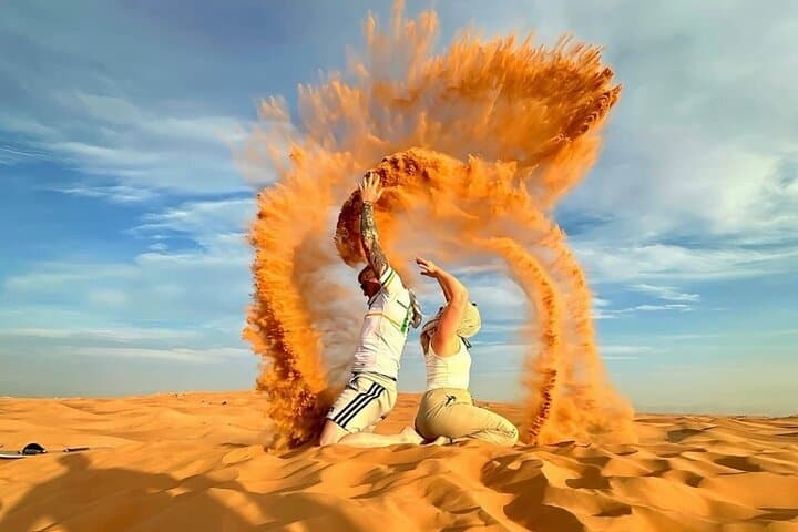 Red Dunes Safari Dubai: Evening Dune Bashing, Sandboarding & Desert Camp Experience photo 3
