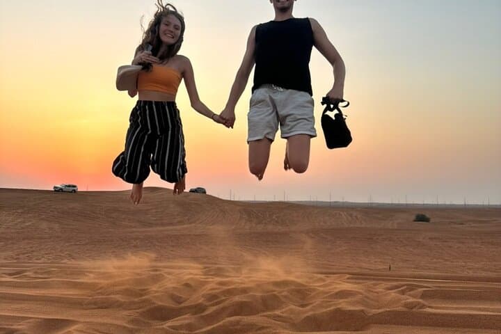 Red Dunes Safari Dubai: Evening Dune Bashing, Sandboarding & Desert Camp Experience photo 4