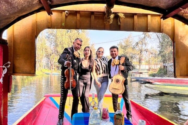 Xochimilco to Coyoacán and CU Fiesta Tour — Trajinera Ride, Tequila Tasting & Frida’s Streets