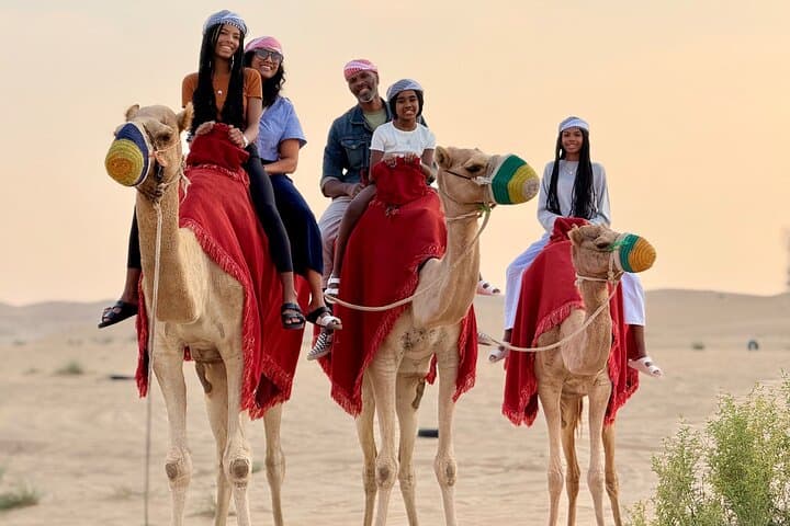 Abu Dhabi Evening Desert Safari: Dune Bashing, Camel Rides & BBQ Buffet photo 2