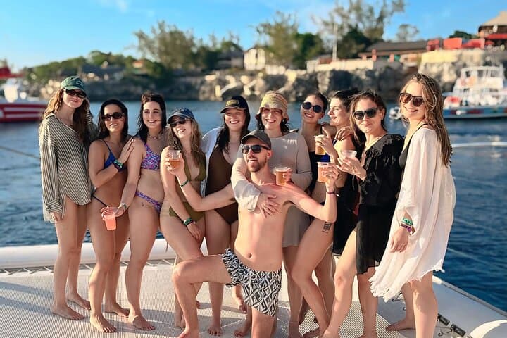 Sunset Catamaran Cruise from Negril to Rick's Cafe — Snorkel, Dolphins & Cliff-Jumping photo 2
