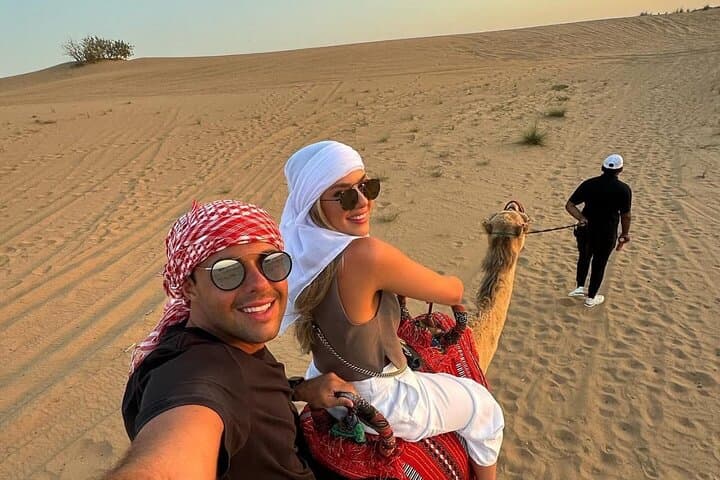 Premium Dubai Desert Safari: Dune Bashing, Camel Ride & Sunset BBQ Experience photo 4