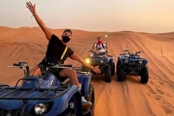 Premium Dubai Desert Safari: Dune Bashing, Camel Ride & Sunset BBQ Experience