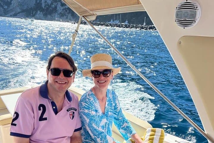 Capri Catamaran Private Boat Tour: Blue Grotto, Faraglioni & Hidden Coves photo 3