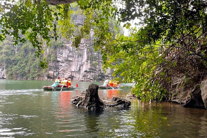 Private Day Tour to Trang An, Hoa Lu & Mua Cave from Hanoi — Boats, Bikes & Summit Views photo 5
