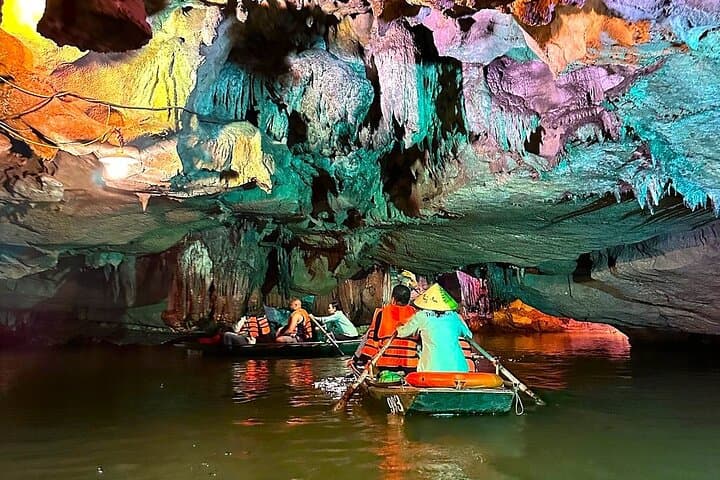 Private Day Tour to Trang An, Hoa Lu & Mua Cave from Hanoi — Boats, Bikes & Summit Views photo 6