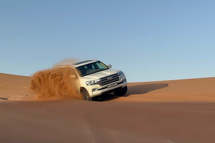 Dubai VIP Desert Safari with BBQ Buffet, Dune Bashing & Live Shows