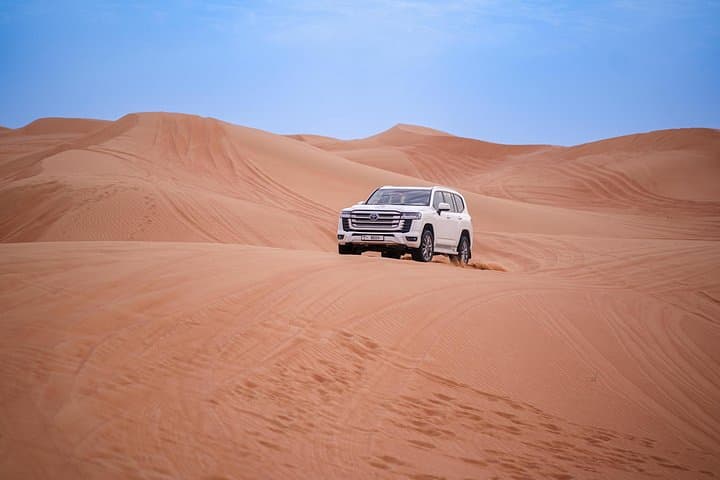 Red Dunes Desert Safari Dubai: Evening 4x4, Sandboarding & Bedouin Camp photo 3