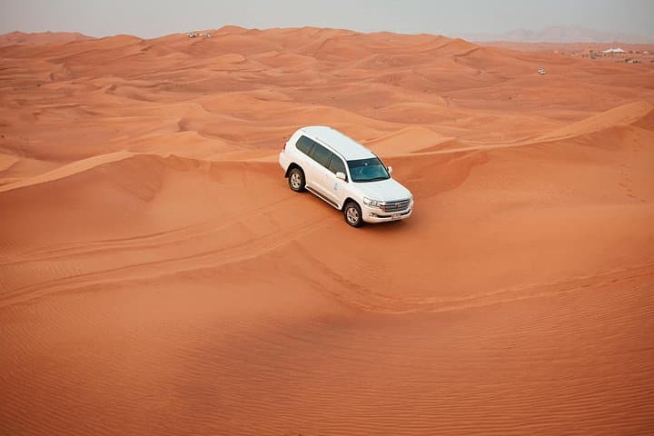 Red Dunes Desert Safari Dubai: Evening 4x4, Sandboarding & Bedouin Camp photo 5