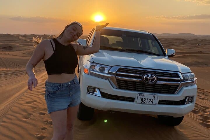 Private Morning Lehbab Red Sand Desert Safari — Camel Ride & Sandboarding
