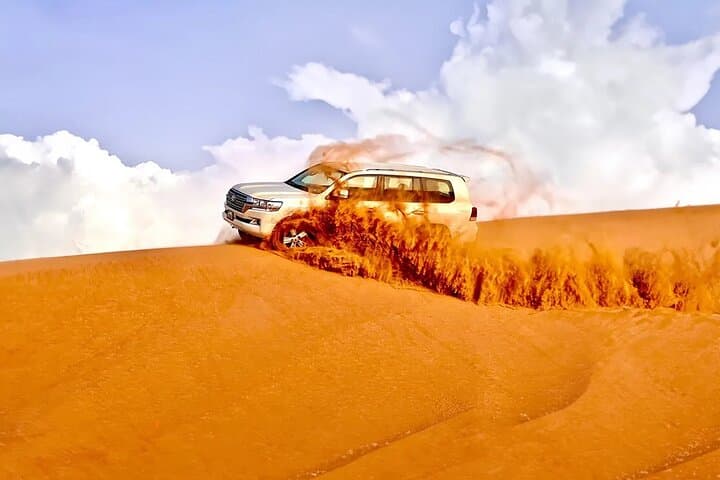 Morning Desert Safari Dubai — Big Red Dunes Dune Bashing, Sandboarding & Camel Ride photo 1