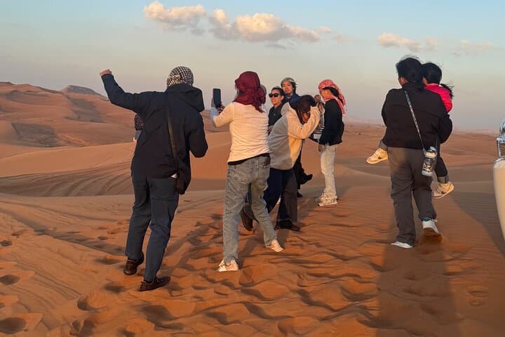Private Morning Lehbab Red Sand Desert Safari — Camel Ride & Sandboarding photo 2