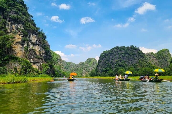 Tam Coc & Hoa Lu Day Trip from Hanoi: Bike Rice Fields, Sampan Boat & Local Family Visit