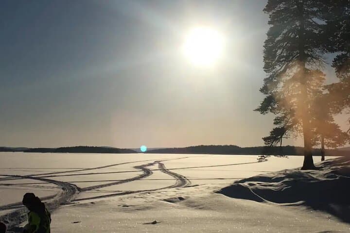 Ice Fishing on Lake Inari: Saariselkä Snowmobile & Sleigh Adventure photo 2