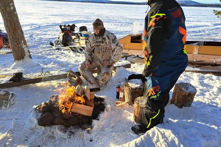 Ice Fishing on Lake Inari: Saariselkä Snowmobile & Sleigh Adventure photo 5