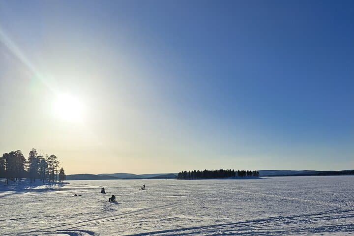 Ice Fishing on Lake Inari: Saariselkä Snowmobile & Sleigh Adventure photo 6