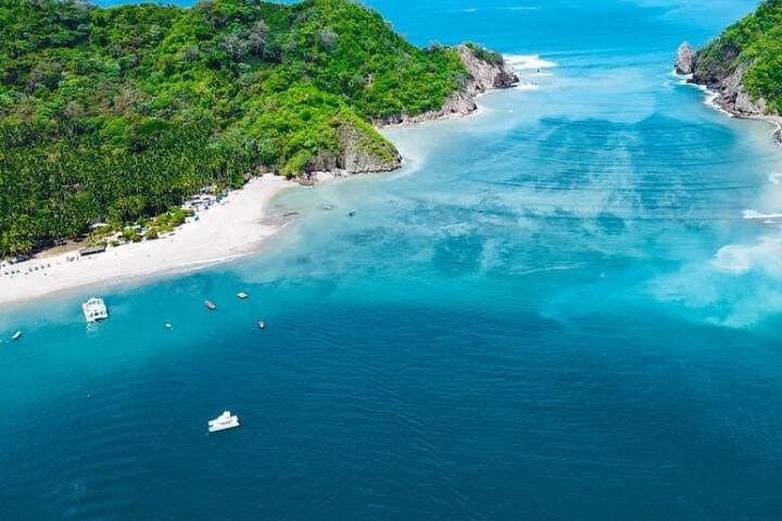 Full-Day Catamaran to Isla Tortuga: Beaches, Snorkeling & Wildlife from San José photo 1