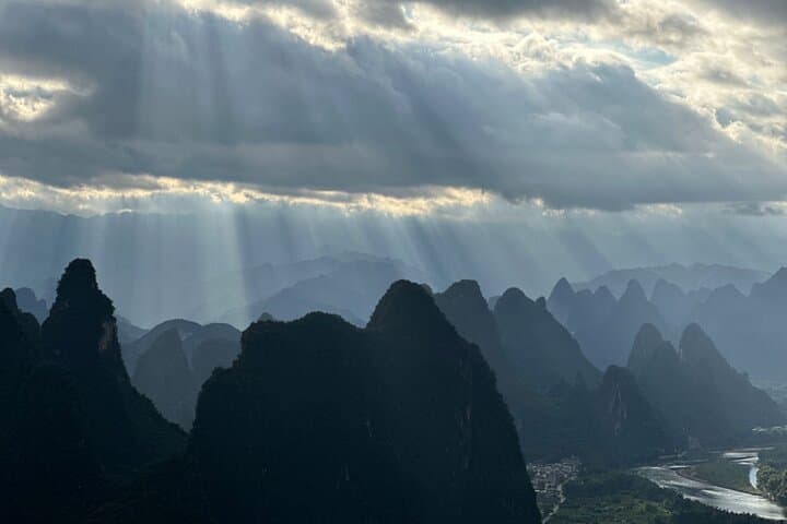 Guilin Mountains and Yulong River Bamboo Boat Day Tour photo 2