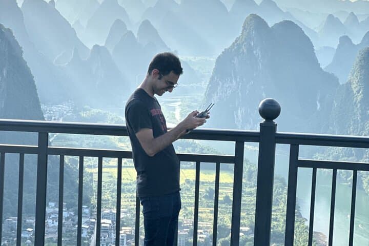 Guilin Mountains and Yulong River Bamboo Boat Day Tour photo 3