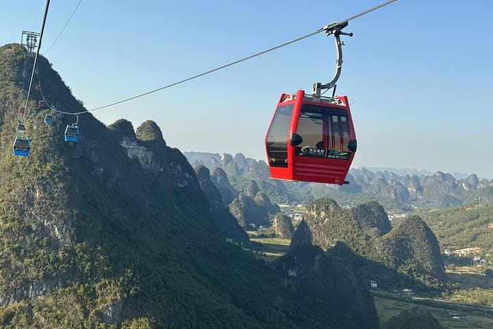 Guilin Mountains and Yulong River Bamboo Boat Day Tour photo 4