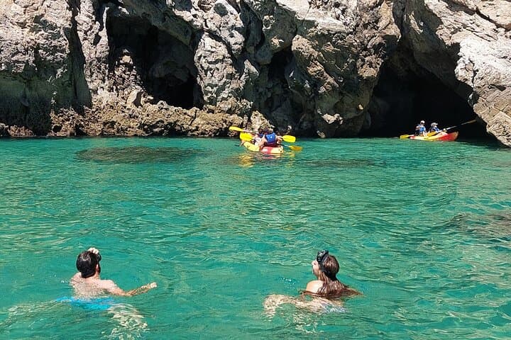 Arrábida Wild Beaches and Caves: Full-Day Private Boat & Snorkeling from Setúbal