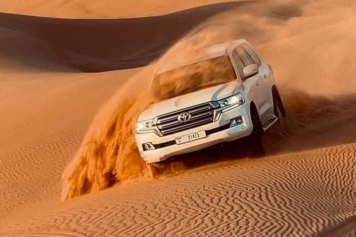 Dubai Evening Desert Safari: Dune Bashing, Camel Rides & BBQ Camp photo 2