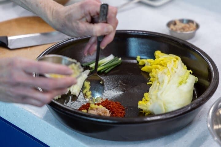 Hands-On Kimchi Making & Mangwon Market Tour in Seoul photo 6