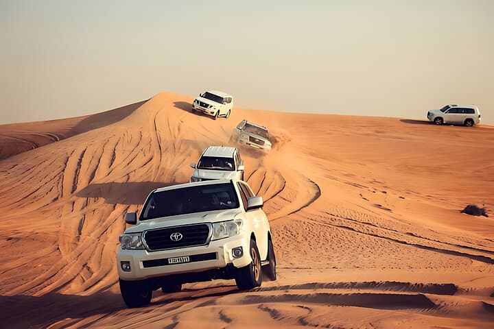 Dubai Private Evening Desert Safari: Sunset Dune Bashing & BBQ Experience photo 4