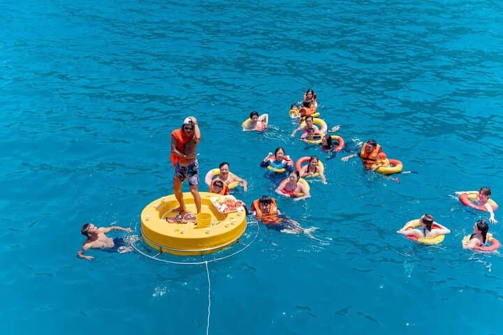 Nha Trang Coral Reef Snorkeling & Floating Bar Party — Day Cruise with SUP, Kayak & Seafood photo 3