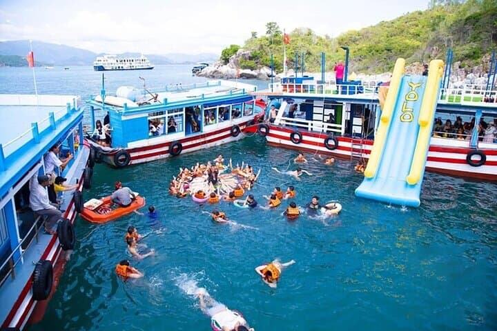 Nha Trang Coral Reef Snorkeling & Floating Bar Party — Day Cruise with SUP, Kayak & Seafood photo 4