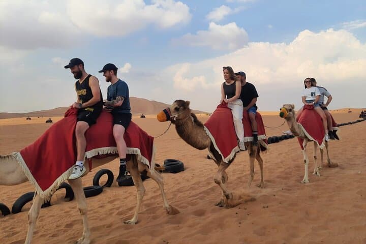 VIP Desert Safari Dubai: Quad Bike & BBQ Dinner with Private 4x4 Transfer photo 1