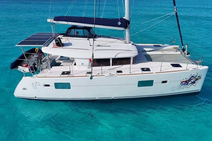 Private Catamaran Tour to Isla Mujeres: Full-Day Sail, Snorkel & Beach Club Experience photo 2