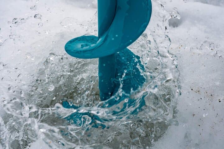 Ice Fishing and Snowshoeing near Rovaniemi: Private Lake Trip with Salmon Soup photo 5