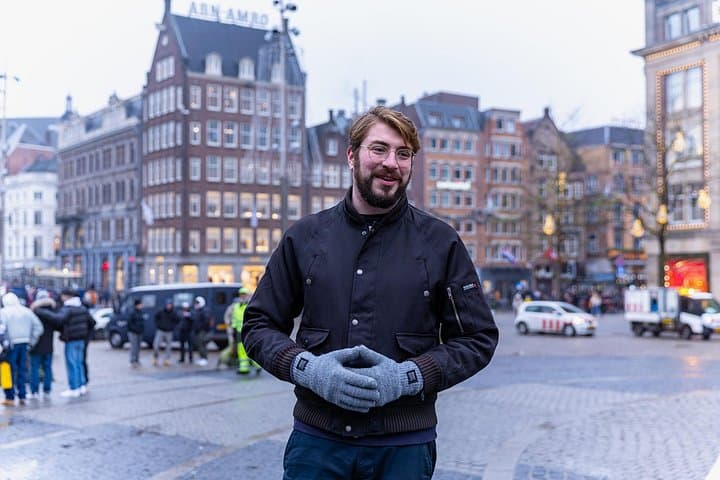 Layover in Amsterdam: Canal Cruise, Walking Tour & Airport Transfer photo 1