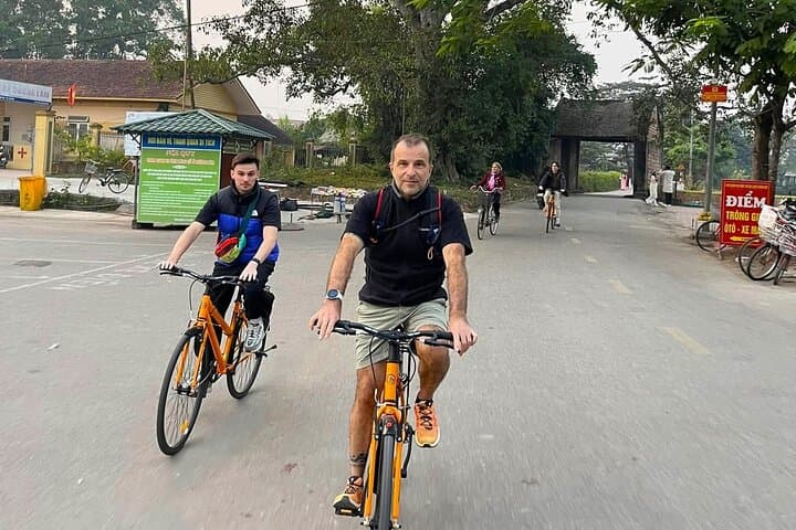 Exploring Duong Lam Ancient Village: A Full-Day Cultural Cycle from Hanoi photo 2