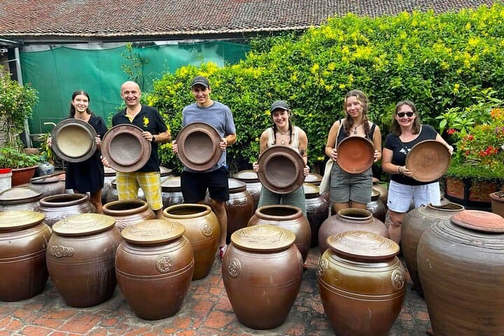 Exploring Duong Lam Ancient Village: A Full-Day Cultural Cycle from Hanoi photo 4