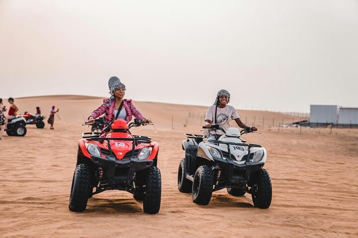 Dubai Desert Quad Bike Safari: ATV Ride, Camel Experience & Dune Photo Stop photo 4