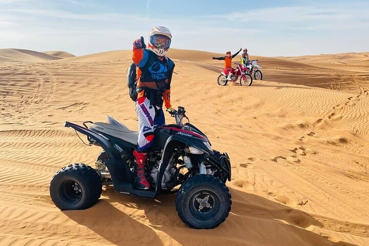 Dubai Desert Safari: Quad Bike, Sandboarding, Camel Ride & BBQ Experience photo 6