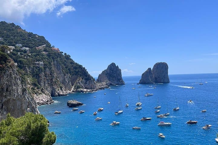 Private 3-Hour Capri Boat Tour: Faraglioni, Blue Grotto & Swim Stops photo 1