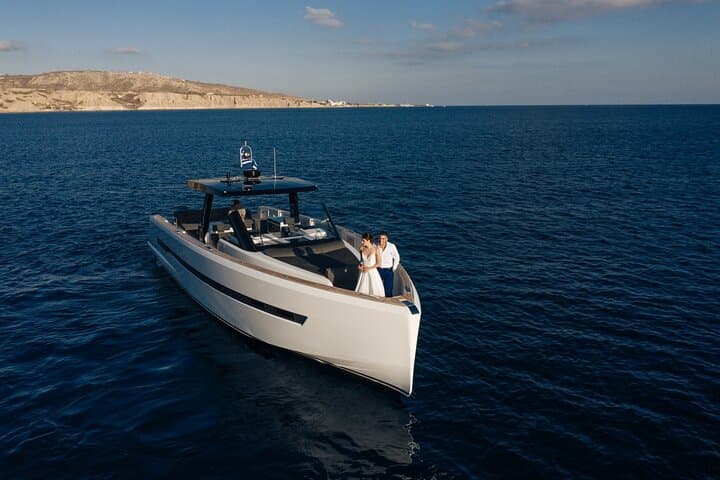 Santorini Caldera Private Cruise Aboard Fjord 52 — Sunset & Hot Springs
