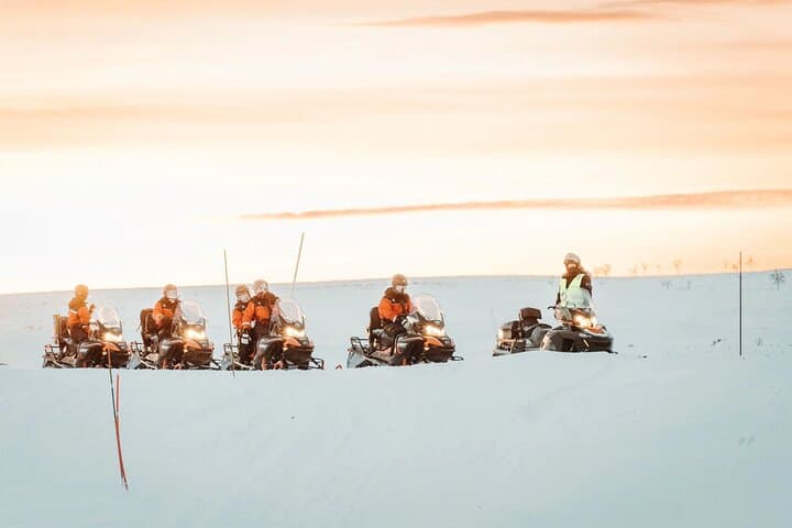 Explore Arctic Wilderness: Snowmobile and Icefishing Adventure in Alta photo 4
